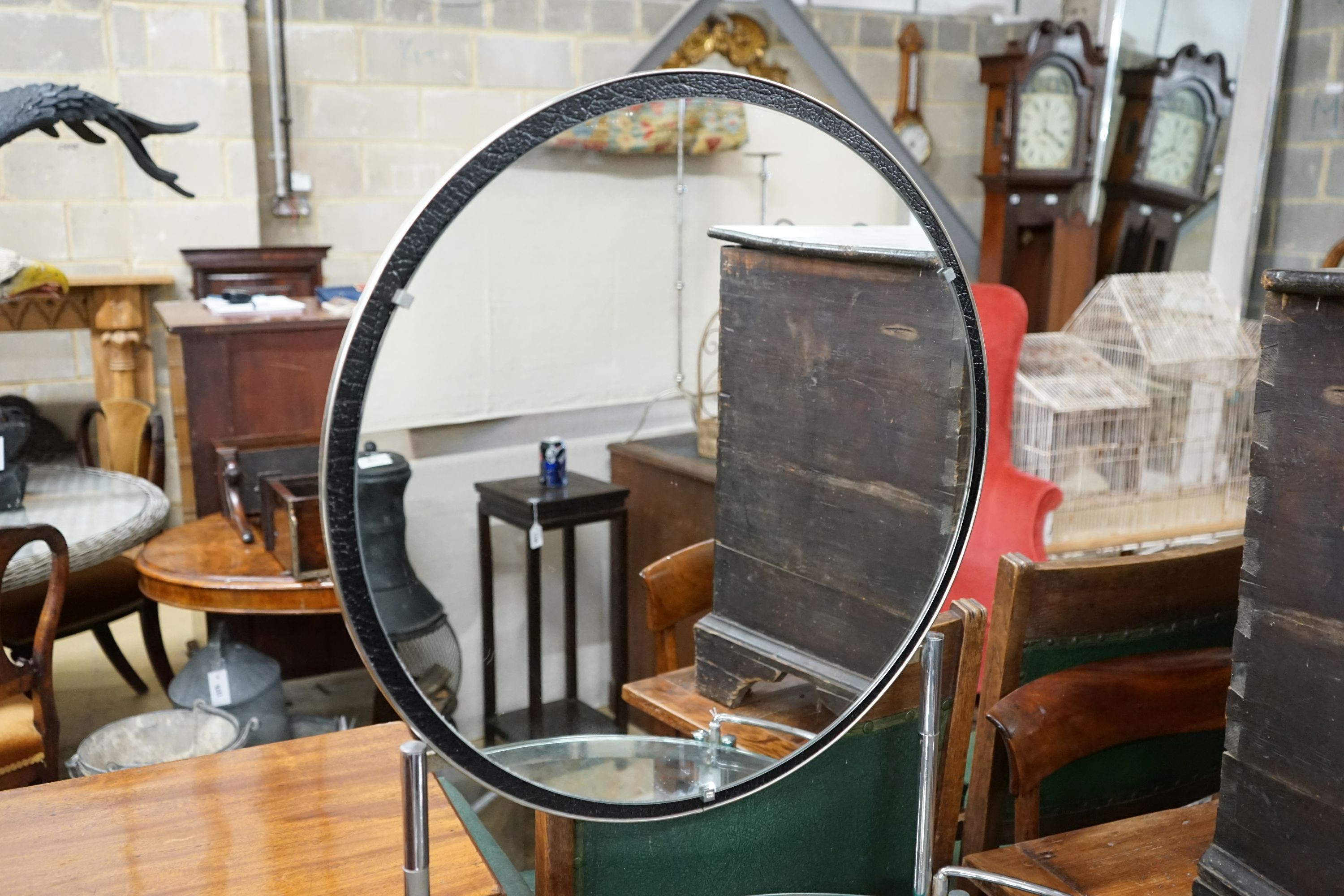 An Art Deco style chrome and glass circular dressing table, diameter 71cm, height 152cm